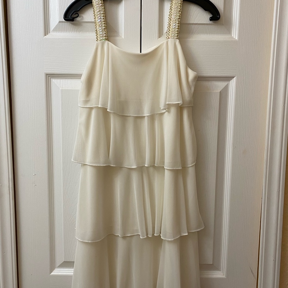 Ruffled white dress with sequin straps
